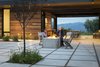 Modern home with Outdoor, Side Yard, Shrubs, Grass, Trees, Walkways, Concrete Patio, Porch, Deck, Pavers Patio, Porch, Deck, and Large Patio, Porch, Deck. On cool summer nights the courtyard becomes a protected haven for marshmallow tastings by young gourmets. Photo 17 of Red Hawk