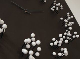 ”MOCAP “ wall clock
description: Most wall-clocks have the same basic shape: round. Also the same looking time-indication by numbers or stripes.
"MOCAP" steps away from the basic..
It's appearance leans more to a piece of conceptual art ,then to a basic time-telling clock.
The big wall clock will catch your eye by changing shape when you walk around it. When you stand in front of the clock: the numbers are clear and visible. When you walk around it: numbers slowly dissolve, and seem to fall apart in little floating white balls.
This optical illusion results in a striking and intriguing piece of wall-art. Inspired by "MOTION CAPTURE" technique used in movies such as" Lord of the rings"+"Avatar"

Design: J.P.Meulendijks for www.Planktonstation.nl
material: wood (recycled)
dimensions: Height: 79 cm. / 31 inch width: 79 cm./ 31 inch depth: 10 cm./ 4 inch .
color: Clock-face finished in matted black, causing the bright white balls to seemingly float in mid-air.
-Clock-hands finished in anthracite so they are subtle visible. against the matted black background .