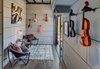 Modern home with Office, Craft Room Room Type, and Chair. Music Room
Soundproofed with recycled denim, marine speakers on top facing the deck for the amplified sound. Photo 6 of Amplified Tiny House