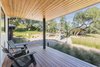 Modern home with Exterior, Metal Siding Material, Gable RoofLine, and House Building Type. Guest House - view to Main House Photo 7 of Wine Country Retreat