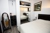 Modern home with Bedroom, Bed, Dresser, Ceiling Lighting, Pendant Lighting, and Vinyl Floor. Calder - Interior 3 - Bedroom Photo 5 of Calder Laneway House - Edmonton