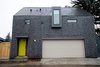 Modern home with Exterior, Apartment Building Type, Shingles Roof Material, and Green Roof Material. East Elevation Photo 13 of Calder Laneway House - Edmonton