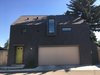 Modern home with Exterior, Apartment Building Type, Shingles Roof Material, and Green Roof Material. East Elevation 2 Photo 14 of Calder Laneway House - Edmonton