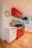 Red Kitchen Photo 11 of Homeland Estate modern home