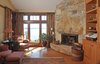 The low E windows provide an abundance of daylight and a visual connection back to the site and lake vistas. Photo 9 of LEED Silver House modern home