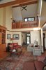 The floors are locally sourced reclaimed hardwood. Additionally, the cherry hardwood trim throughout the house was harvested on site. Photo 11 of LEED Silver House modern home