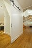 Utilizing a stacking concept for the programmatic layout, this home strives to achieve a minimal footprint on the landscape, while allowing the open interaction between spaces. Photo 11 of Barn Reinvented - LEED Platinum Home modern home