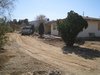Modern home with Outdoor, Front Yard, and Desert. This is what the original building looked like when first purchased. Photo 3 of Modern Jewel in the Desert