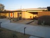 Modern home with Outdoor, Desert, Concrete Pools, Tubs, Shower, Side Yard, and Small Pools, Tubs, Shower. Carport was framed in to house the indoor pool. Photo 10 of Modern Jewel in the Desert