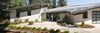 Modern home with Exterior, House Building Type, Stucco Siding Material, Metal Roof Material, Metal Siding Material, Shed RoofLine, and Flat RoofLine. Gregory Creek Residence Photo 5 of Gregory Creek Residence
