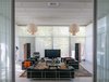 Modern home with Living Room, Pendant Lighting, Sofa, Chair, Coffee Tables, Terrazzo Floor, and Rug Floor. 2016 Harkavy House Living Room Photo 2 of Harkavy House