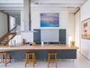 Modern home with Kitchen, Wood Counter, Refrigerator, Metal Cabinet, Pendant Lighting, Range Hood, Cooktops, Undermount Sink, Wine Cooler, and Terrazzo Floor. 2016 Harkavy House Kitchen Photo 3 of Harkavy House