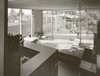 Modern home with Living Room, Chair, Pendant Lighting, Terrazzo Floor, Table, and Storage. 1957 Harkavy House Living Room and Back Porch Photo 10 of Harkavy House