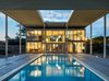 Modern home with Exterior, Flat RoofLine, House Building Type, Green Roof Material, and Wood Siding Material. Umbrella House Photo 7 of Umbrella House