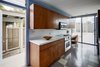 Modern home with Kitchen, Laminate Counter, Wood Cabinet, Range, Linoleum Floor, Microwave, and Recessed Lighting. Umbrella House, kitchen Photo 9 of Umbrella House