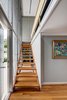Modern home with Staircase and Wood Tread. Umbrella House, interior Photo 10 of Umbrella House