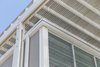 Modern home with Exterior, Wood Siding Material, Flat RoofLine, and House Building Type. Umbrella House, roof detail Photo 11 of Umbrella House