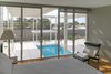 Modern home with Medium Hardwood Floor and Chair. Umbrella House, master bedroom Photo 14 of Umbrella House