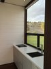 Kitchen with a view Photo 5 of The River Cabin modern home