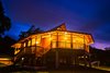 Modern home with Exterior, Metal Roof Material, Gable RoofLine, Beach House Building Type, and Wood Siding Material. The evening glow Photo 2 of Hawaii Bamboo Home
