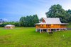 Modern home with Outdoor, Side Yard, and Large Patio, Porch, Deck. Tropical living! Photo of Hawaii Bamboo Home