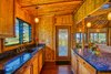 Modern home with Kitchen, Quartzite Counter, and Wood Cabinet. Custom cabinets made from Bamboo Photo 9 of Hawaii Bamboo Home