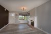 Modern home with Living Room, Ceiling Lighting, and Gas Burning Fireplace. The living room Photo 4 of Briarwood Place
