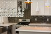 Modern home with Dining Room and Ceiling Lighting. Close up on the chandelier in the dining room Photo 7 of Briarwood Place