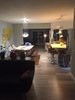 Modern home with Dining Room, Table, Bench, Stools, Chair, Pendant Lighting, Lamps, and Ceiling Lighting. View from the living room through the family room. Photo 15 of Briarwood Place