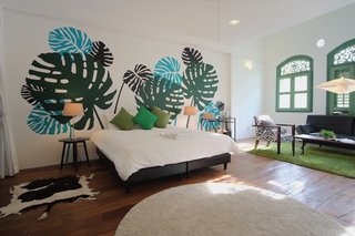 The Fern Suite is a colorful, tropical space that fits three to six guests comfortably.
