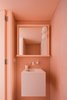 Modern home with Bath Room, Wall Mount Sink, Accent Lighting, Ceramic Tile Wall, and Mosaic Tile Wall. In the 1930s in Australia, bungalows that were built in the Arts and Crafts style were often designed to have their decorative Photo 10 of House Au Yeung