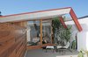 Modern home with Outdoor, Concrete Patio, Porch, Deck, Trees, Desert, Gardens, and Side Yard. Beckmann and Trowbridge are the co-owners of this resort-style property, which they started working on eight years ago. They describe their unique architectural project as a "micro-resort—a hybrid between luxury rental and boutique hotel." Photo 3 of The Lautner
