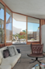 Modern home with Living Room, Sofa, Chair, Concrete Floor, Coffee Tables, and Carpet Floor. "We are a ‘little slice of heaven’ for any architecture, interior design, and midcentury modern aficionado," says Beckmann. The units are available for rent through Boutique Homes. Photo 6 of The Lautner