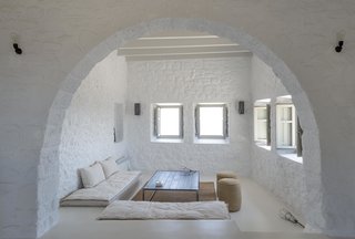 Resting along the crest of a volcanic crater on the little-known island of Nisyros in the Aegean Sea, Villa Nemésis marries the mystique of ancient Greece with modern design.