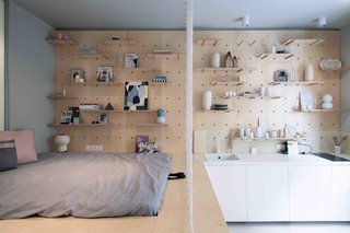3 Smart Storage Systems Maximize Space in a Tiny Studio Apartment in Budapest - Photo 1 of 10 -
