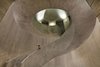 Modern home with Staircase and Concrete Tread. This topography of hills and caves guided the design of the passageways, which undulate through mysterious corridors. There's also a sculptural spiral staircase that descends into the cavernous Spa Alila. Photo 13 of Alila Yangshuo