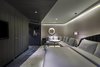Modern home with Bedroom, Bed, and Carpet Floor. By capturing the historic character of Beijing and the zeitgeist of an increasingly globalized China, Vue Hotel Hou Hai promises the mystic of Chinese culture with an edgy cosmopolitan allure. Photo 13 of Vue Hotel Hou Hai
