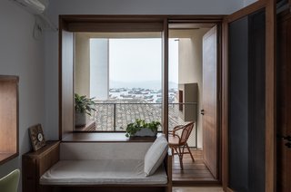 A balcony that looks out to the busy port.