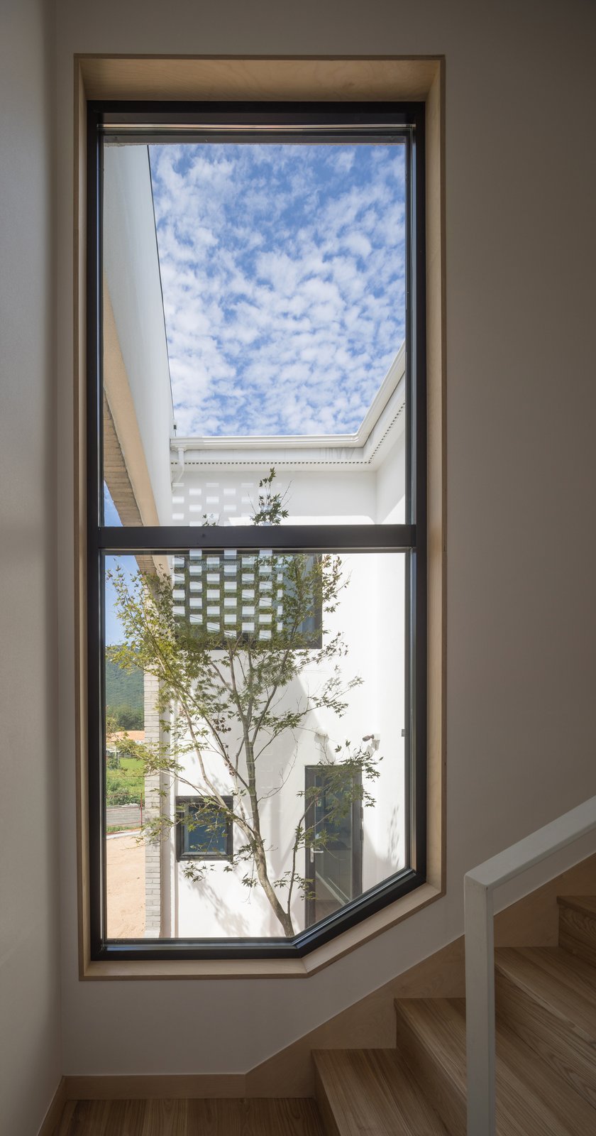 Photo 14 of 14 in A Gabled Corridor Runs Through This Playful South