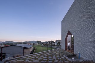 A raised terrace at the back of the house.