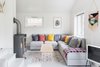 Modern home with Living Room, Coffee Tables, Sectional, and Wood Burning Fireplace. A wood-burning fireplace keeps the second living lounge warm in winter. Photo 7 of Hellum House