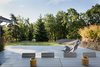 Modern home with Outdoor, Woodland, Large Patio, Porch, Deck, Wood Patio, Porch, Deck, Decking Patio, Porch, Deck, Trees, Grass, and Back Yard. The large outdoor terrace surrounded by trees. Photo 10 of Hellum House