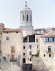 Modern home with Exterior, Stone Siding Material, Tile Roof Material, and House Building Type. The small medieval city and university town of Girono sits along the River Onyar. Photo 3 of Girona Townhouse