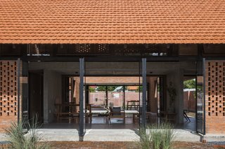 A buffer space between the living area and the front yard.