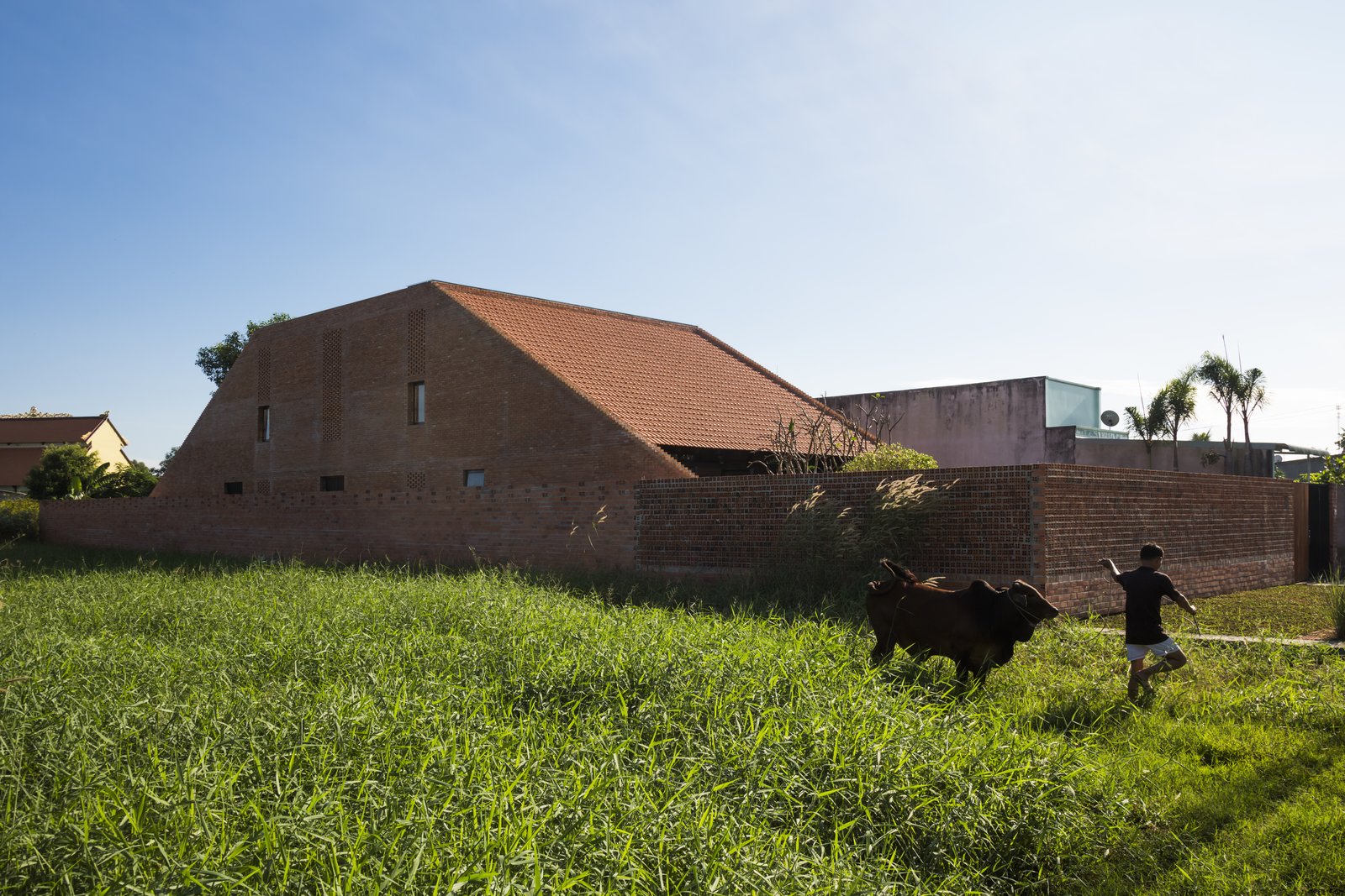 Photo 1 of 15 in Light and Shadow Help Shape This Modern Brick House in