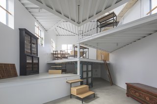 Angular, flag-shaped platforms increase floor space vertically.