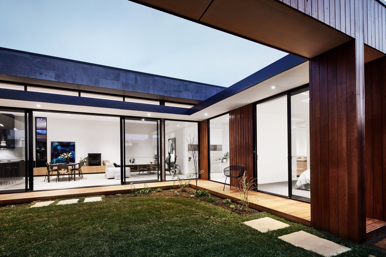 All the spaces in the house enjoy courtyard access.