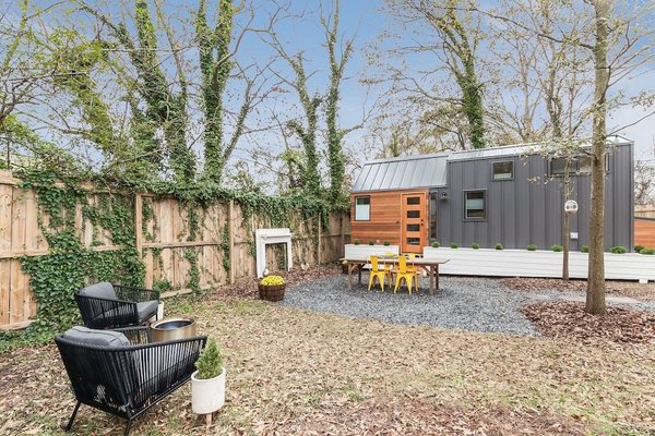 The house has modern farmhouse inspired interiors, two queen sized beds and a loft bedroom.