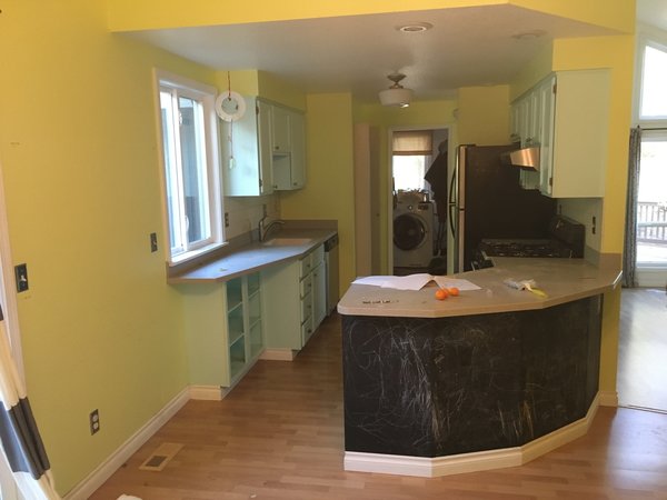 To solve the problem of a cramped kitchen, the team came up with plans for a very functional kitchen built to the style that Suraya had provided in the pictures.
