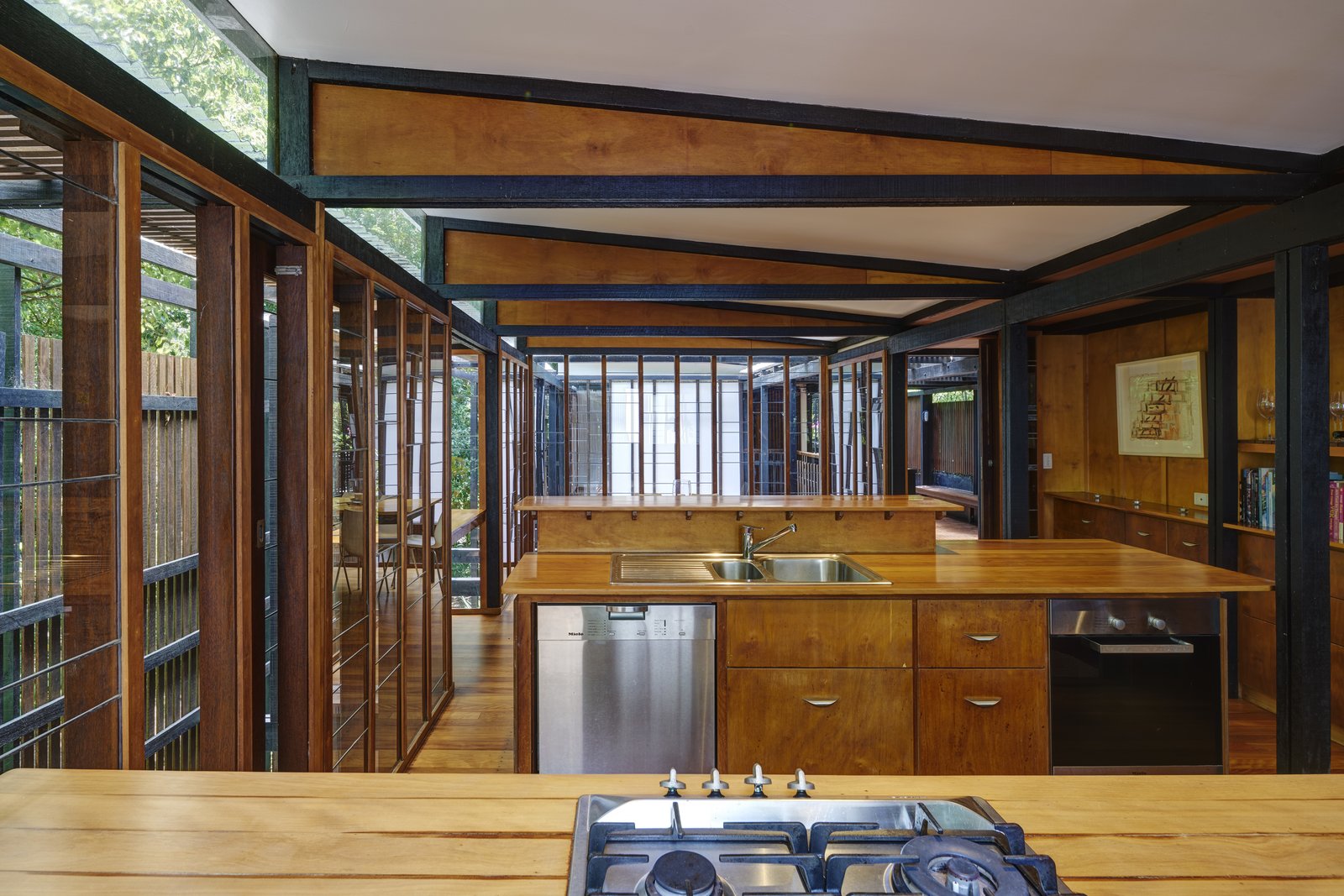 The children’s bedrooms are located on the upper level, closer to the dining, kitchen and decks, while the parents’ bedroom are located on the lower level or more privacy.